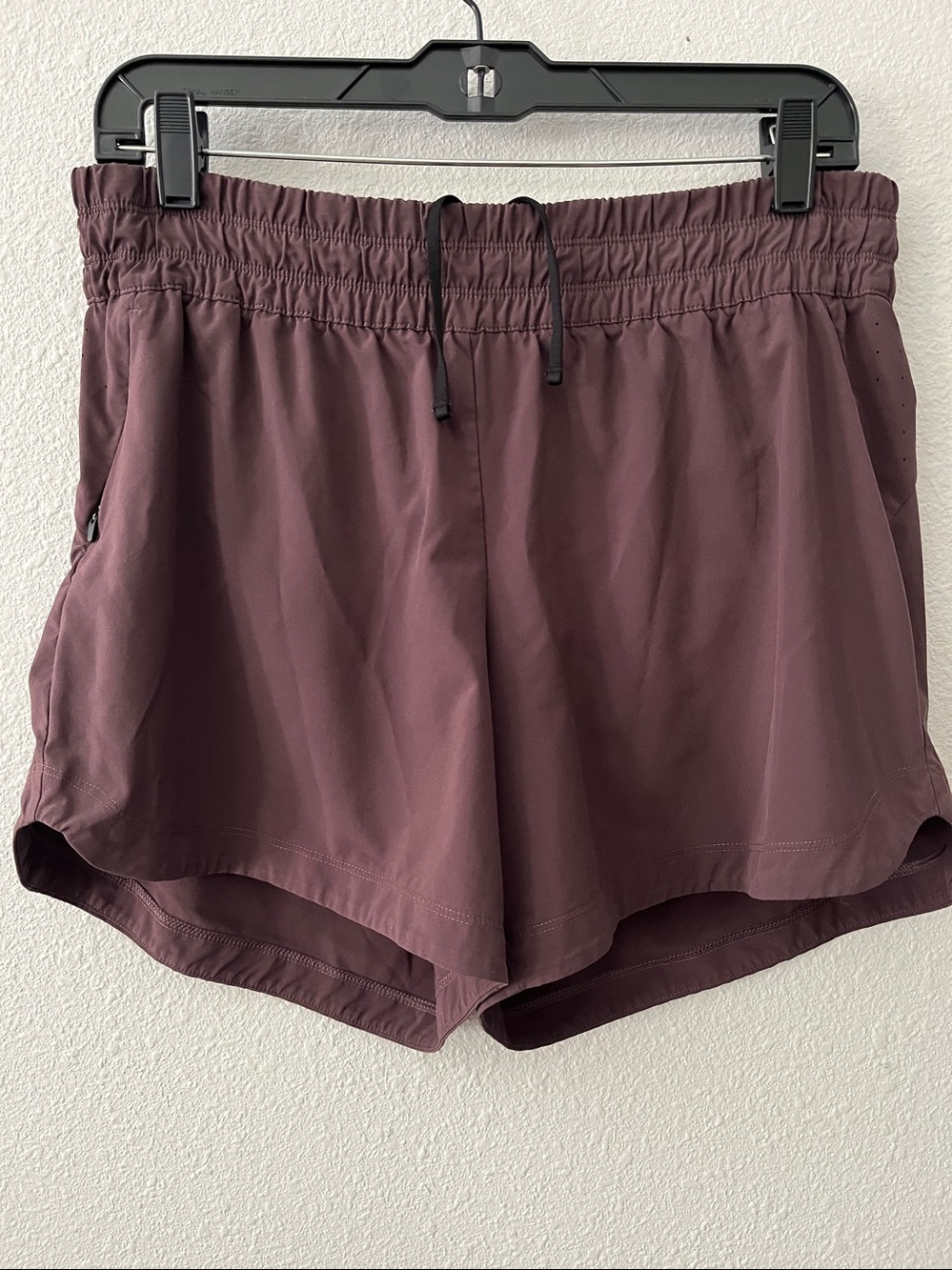 REI Co-op Plum  Athletic Running Shorts, side pocket adjustable waist.
SZ M